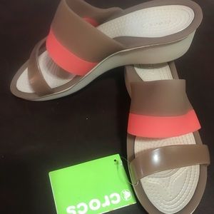 Brand new CROCS wedge sandals.
